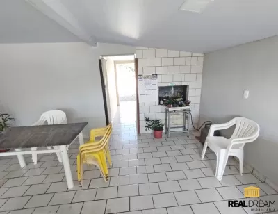 Churrasqueira e garagem